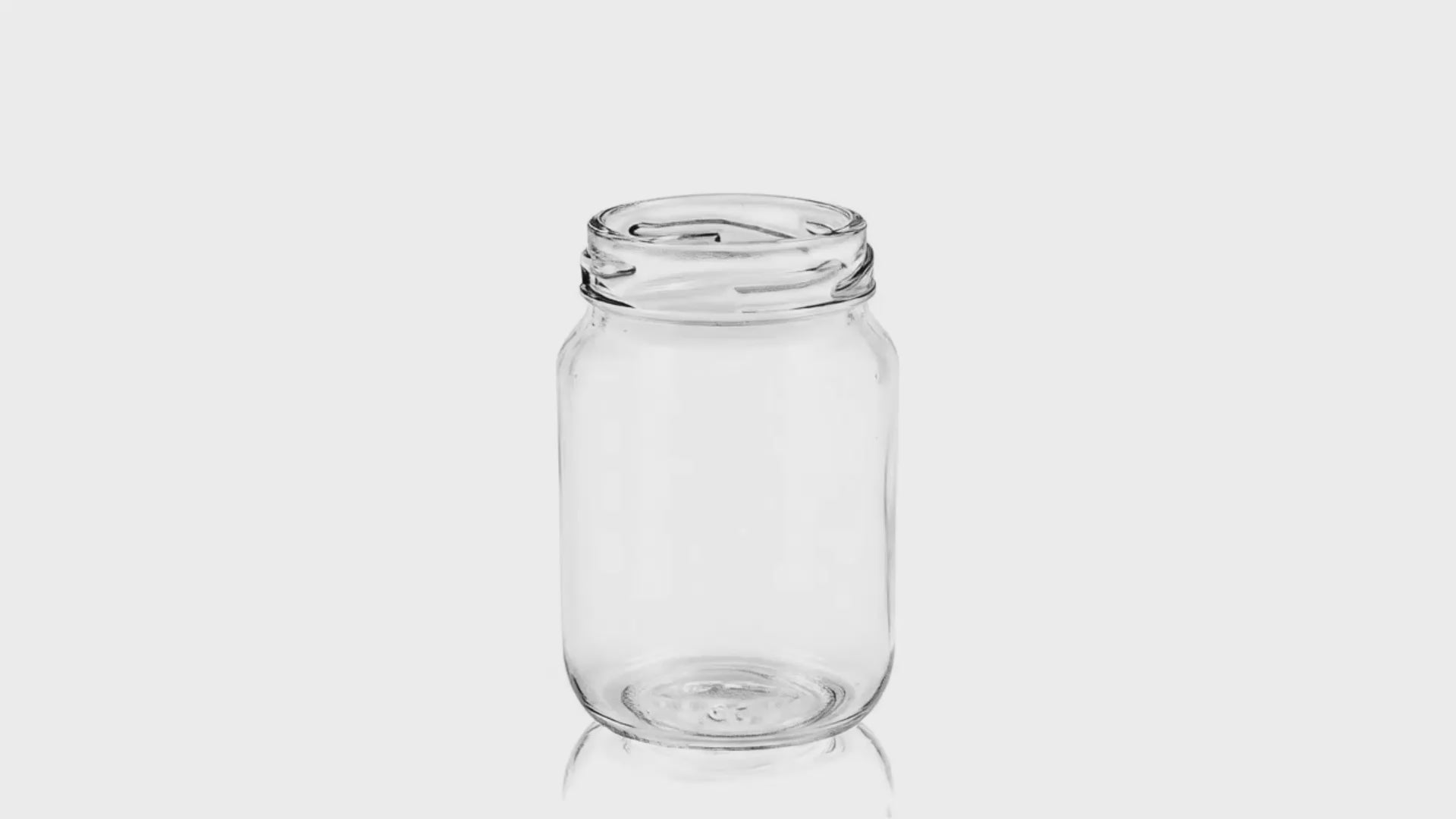Load video: 125 ml Clear Glass Round Universal Jar
