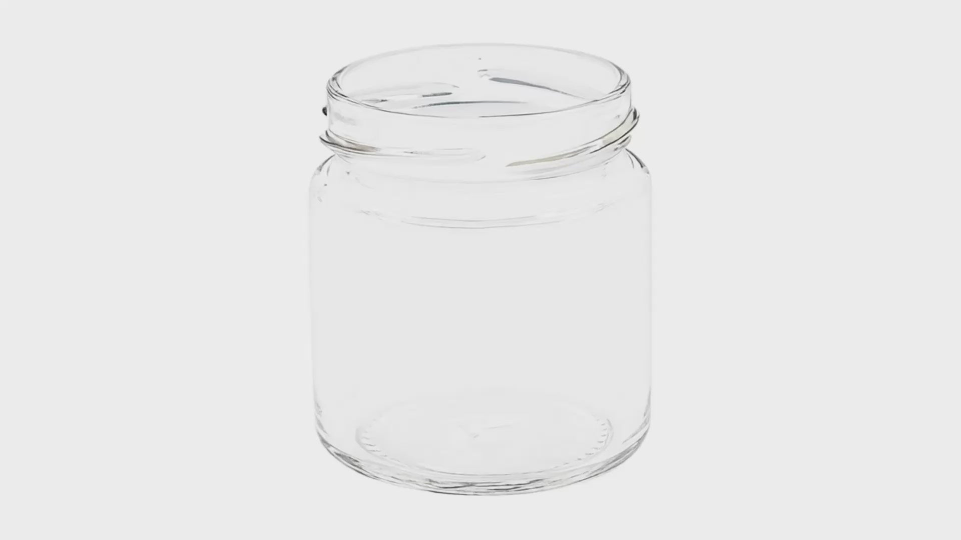 Load video: 4 OZ CLEAR FLINT GLASS ROUND STRAIGHT SIDED JAR