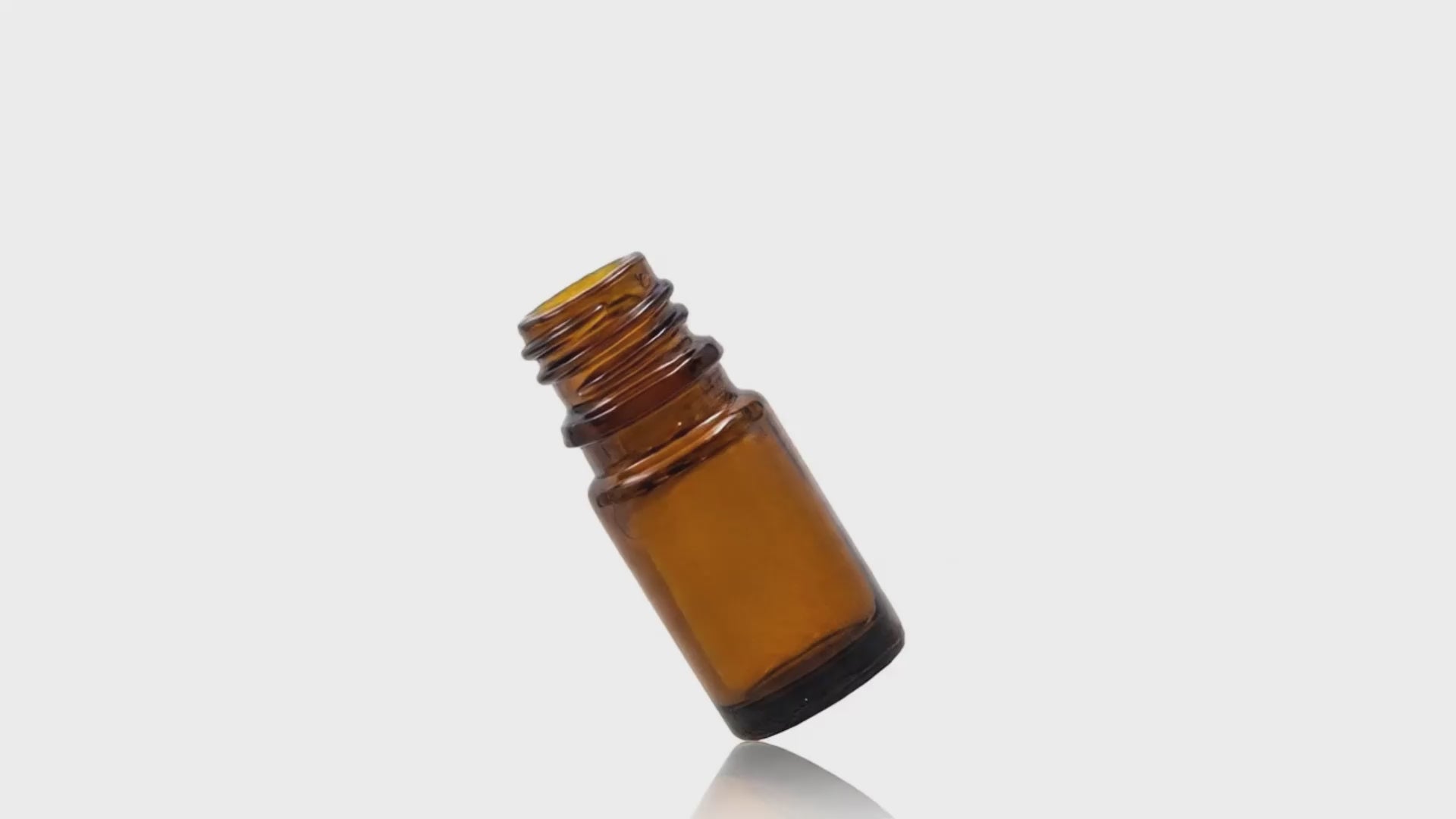 Load video: 5 ML Amber Glass Round Tamper Evident Vertical Dropper Bottle 18GL