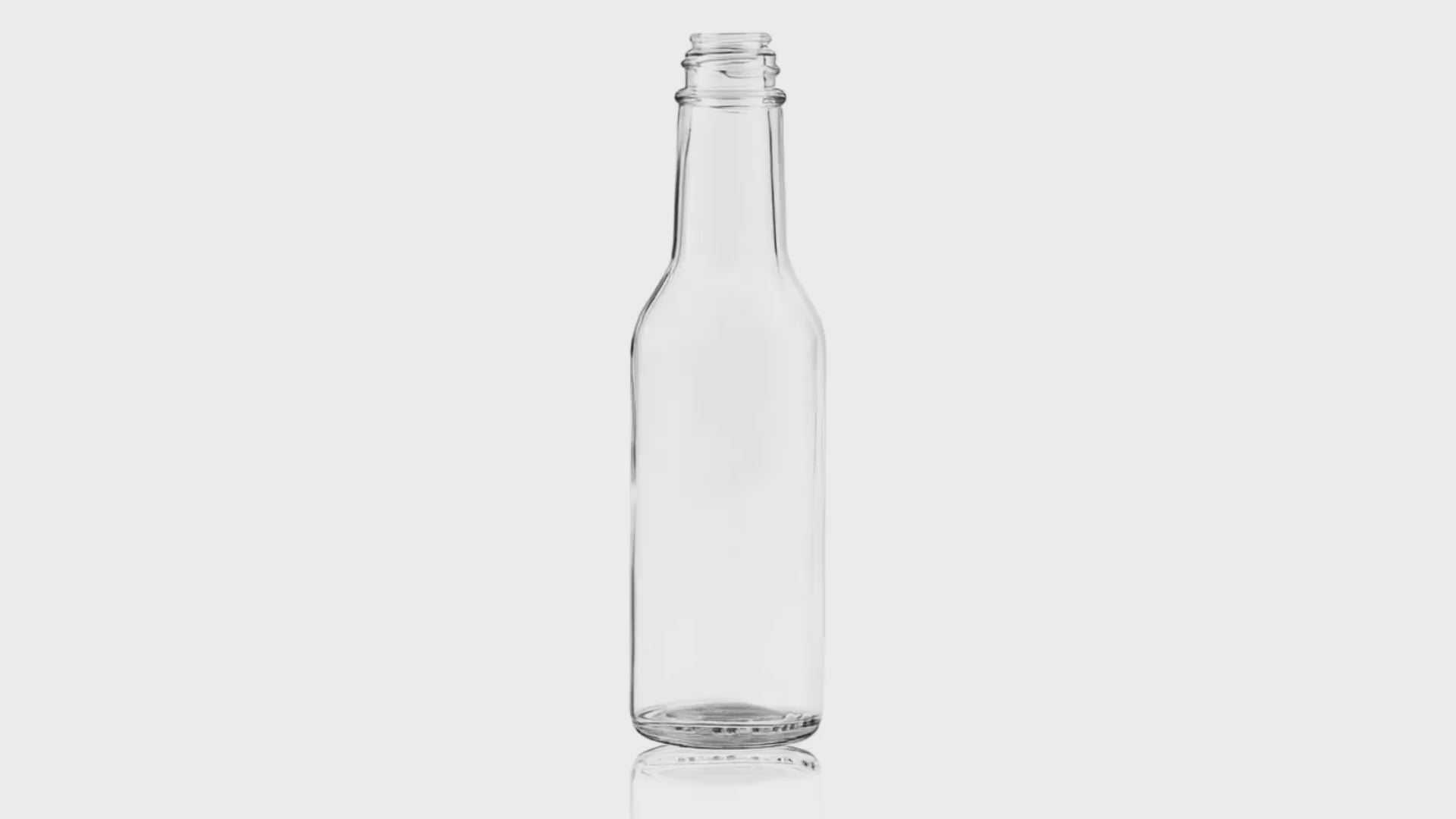 Load video: 375 ml Clear Glass Round Composite Bottle