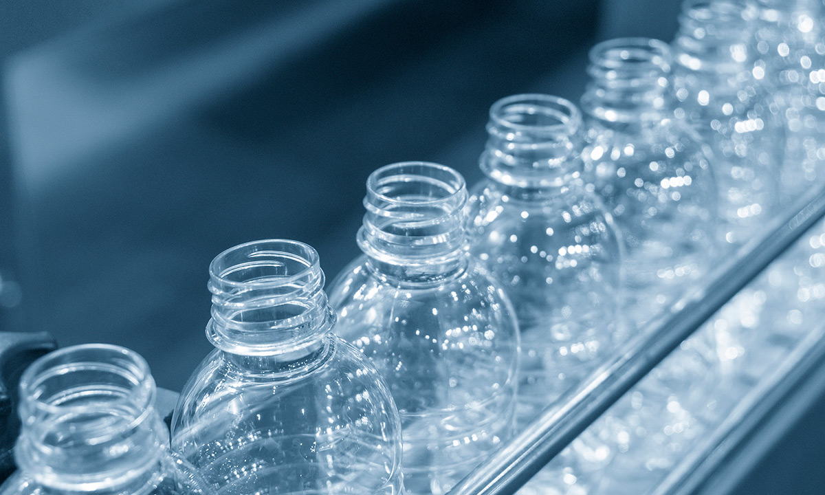 Multiple plastic bottles in production by Richards Packaging.